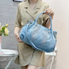 Vintage-Inspired Tote with Rhinestone Wing Design