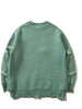 Vintage-Inspired Distressed Sweater with "Indie" Embroidery, Ripped Detail, and Fringe Hem.