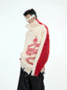 Snake motif knit sweater